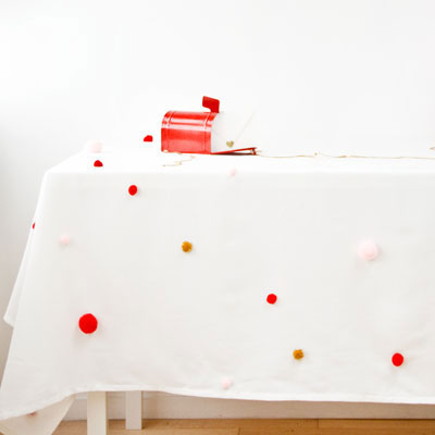 DIY Pom Pom Tablecloth for The Sweetest Occasion