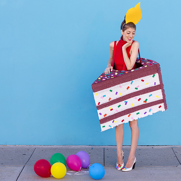 A woman dressed as a slice of cake