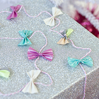 DIY Tiny Duct Tape Bow Gift Garland