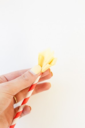 Someone holding yellow paper