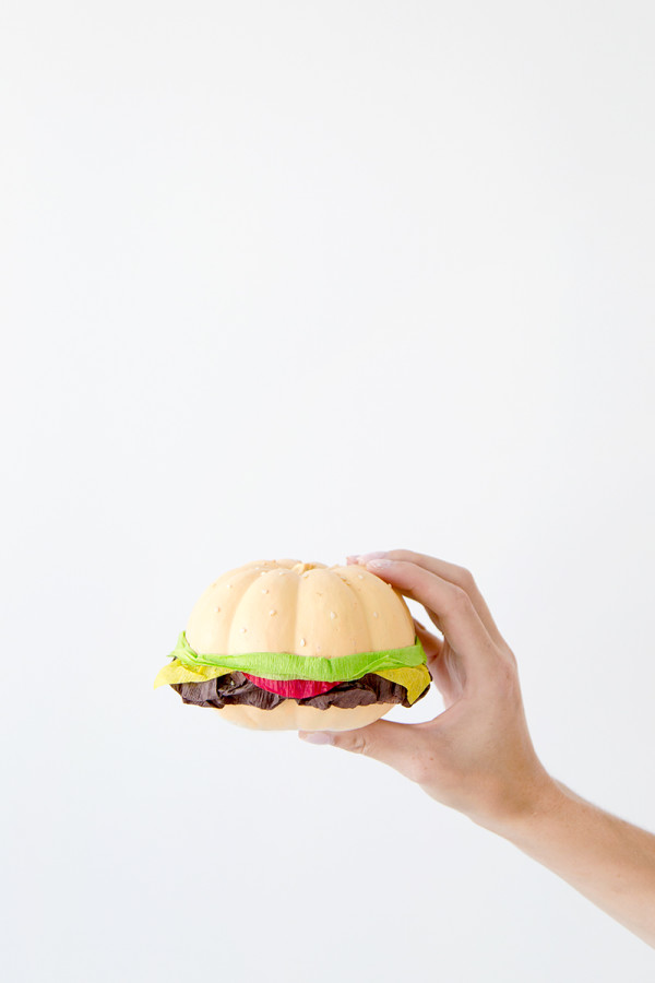 Someone holding a fake burger