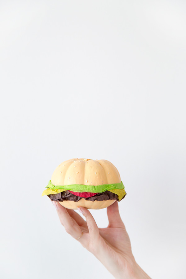 Someone holding a fake burger