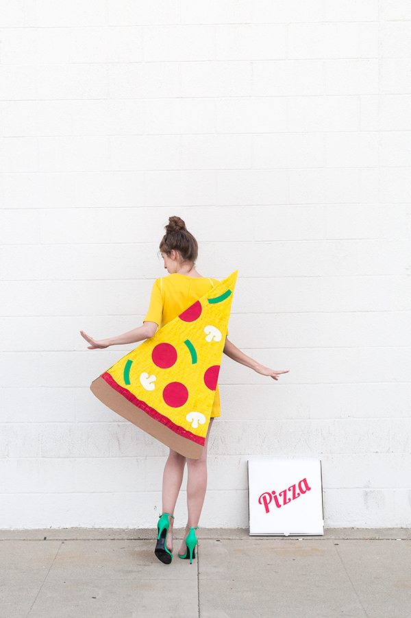 A woman in a pizza costume 