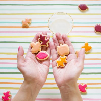 Someone holding fall cookies