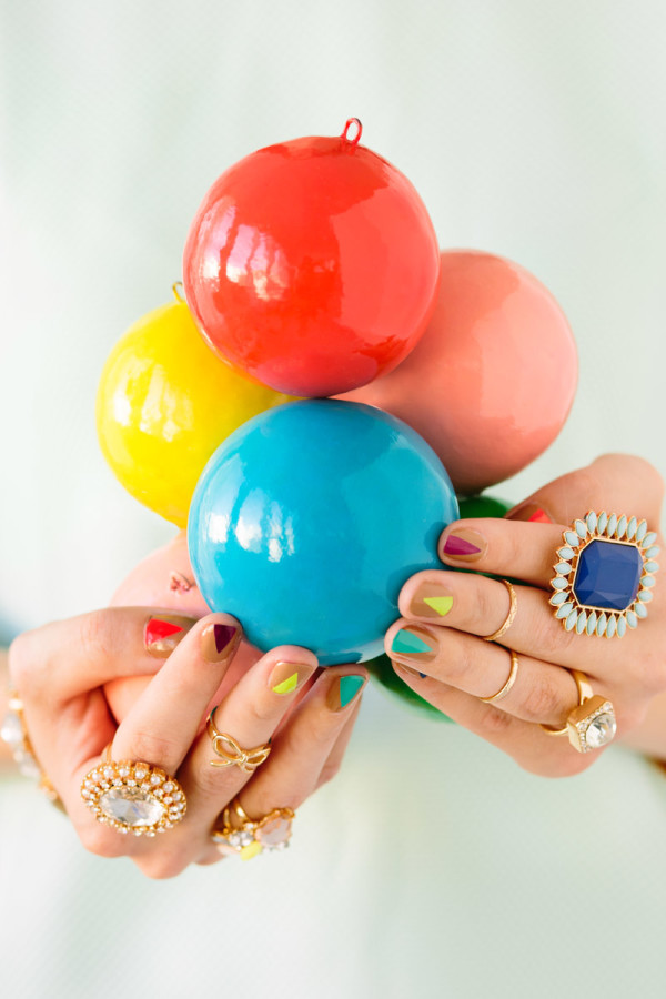 Someone holding colorful glass balls