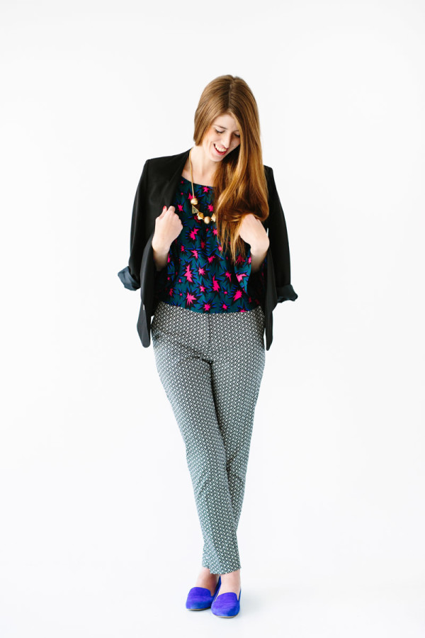 A woman wearing pants and a blazer