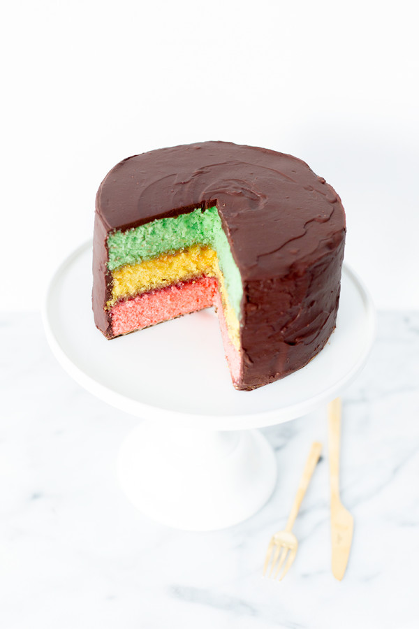 A chocolate cake with colorful layers