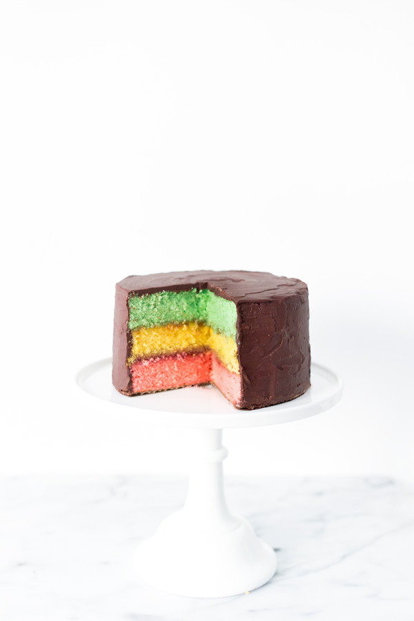 A chocolate cake with colorful layers