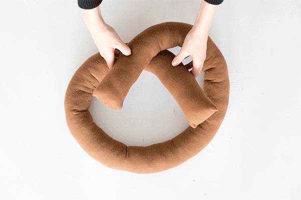 A GIF of a pretzel pillow