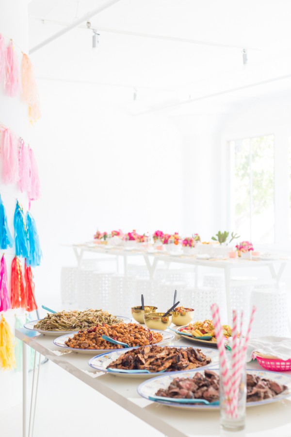 Tables with flowers and snacks