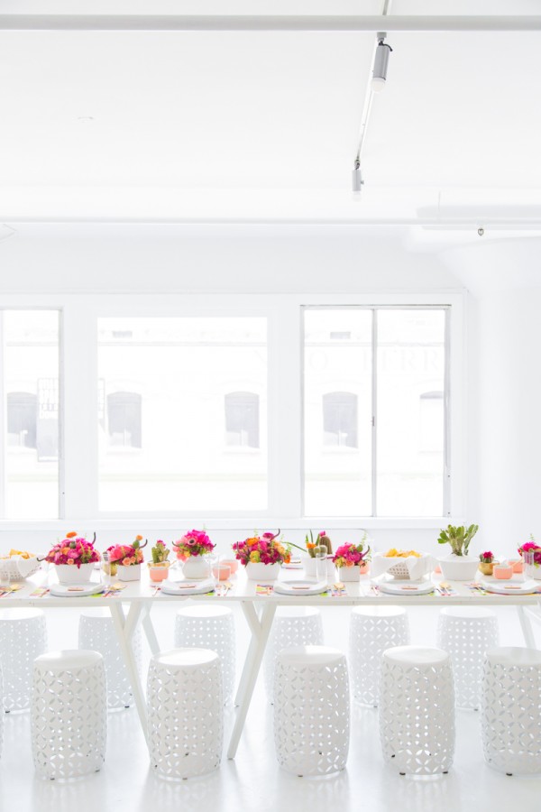 Table set up with flowers and chairs