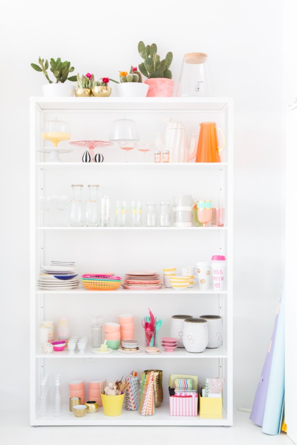 A shelf with kitchen supplies on it