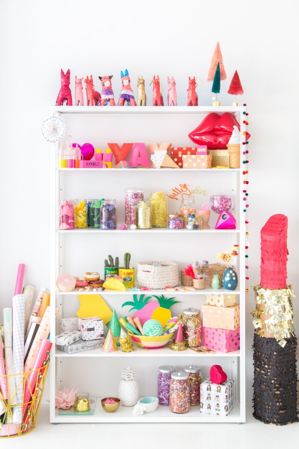 A shelf with a bunch of colorful items on it