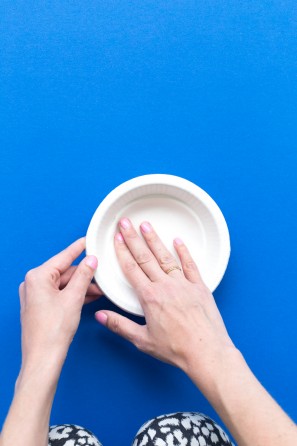 Someone making a bowl