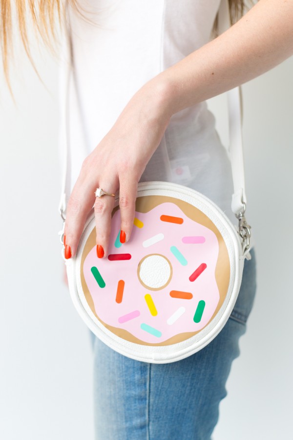 Someone wearing a donut purse