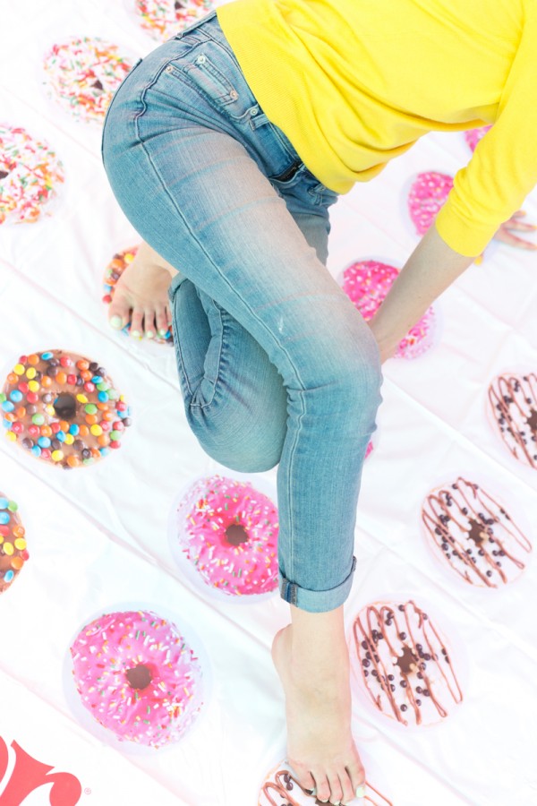 Someone playing donut twister