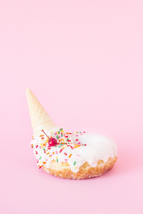 A donut with an ice cream cone in it