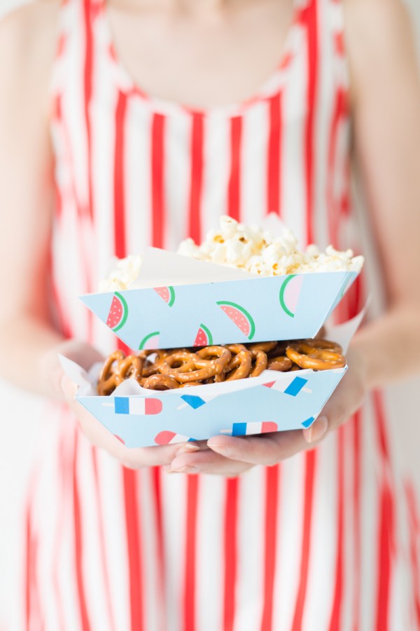 Someone holding snack trays