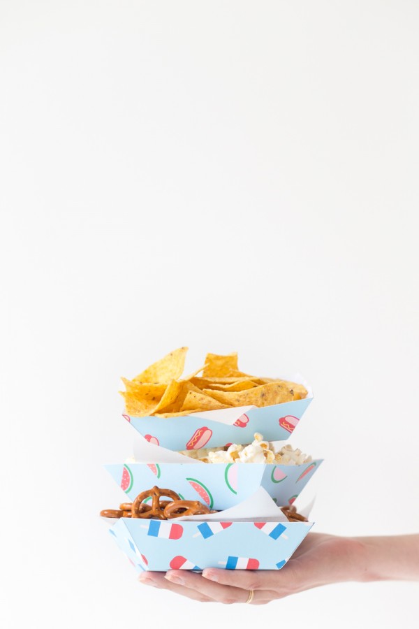 Snack trays piled on each other