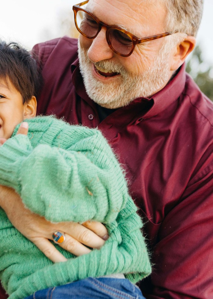 Grandfather holding child