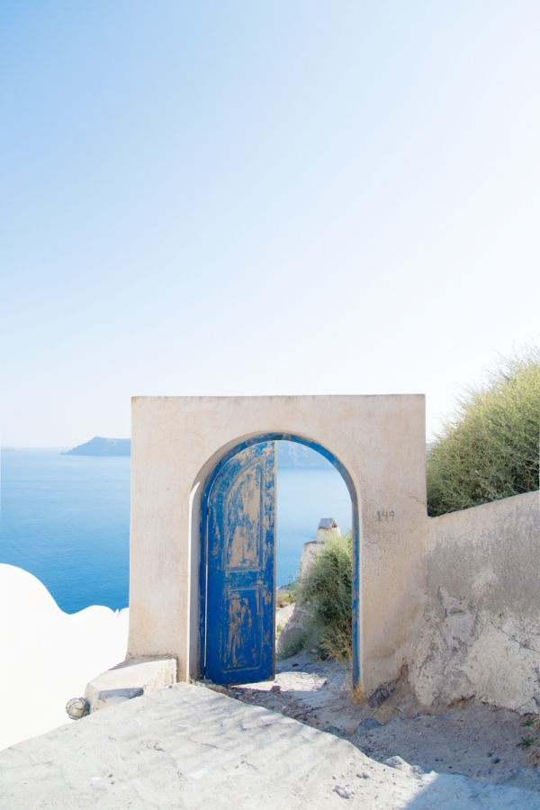 A door frame with blue doors