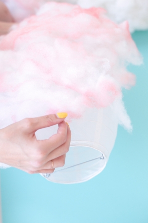 Someone holding pink cotton candy