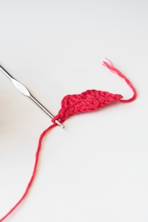 Knitting needle and pink shape