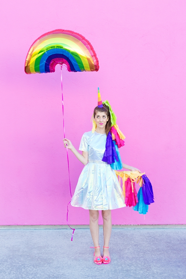 A woman dressed in a unicorn costume