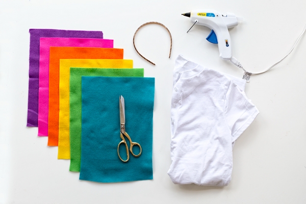 Rainbow papers, a shirt, and a glue gun