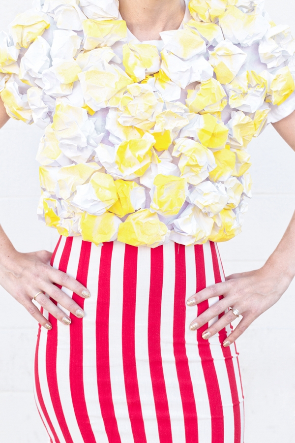 A woman wearing a popcorn costume