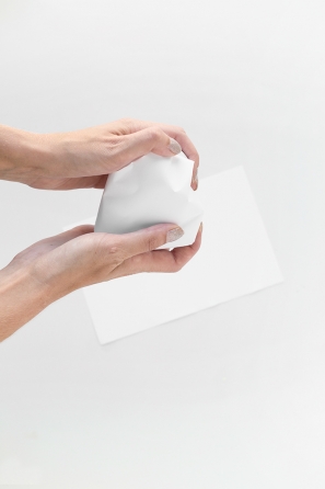 Someone holding a white material 