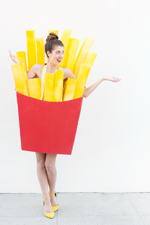 A woman wearing fry costume