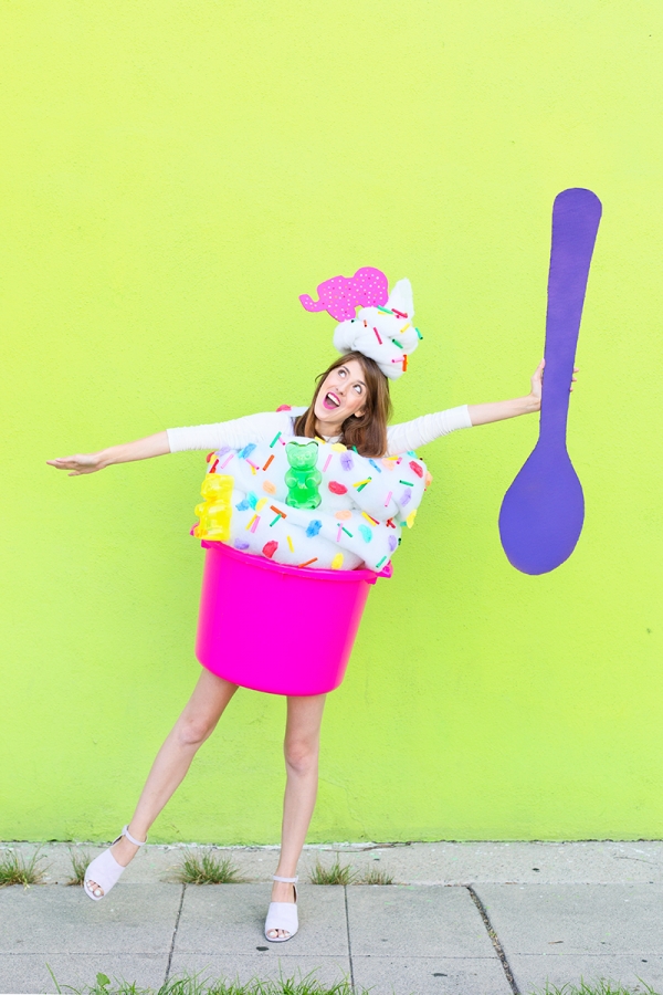 A woman dressed in a froyo costume 