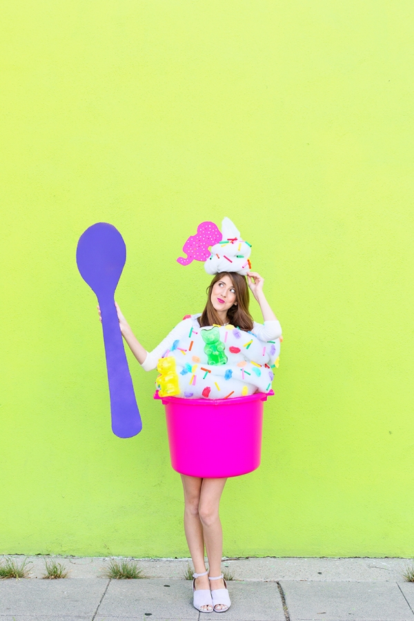 A woman dressed in a froyo costume 