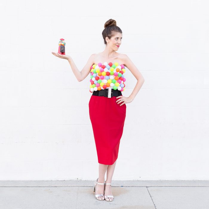 A woman dressed as a gumball machine