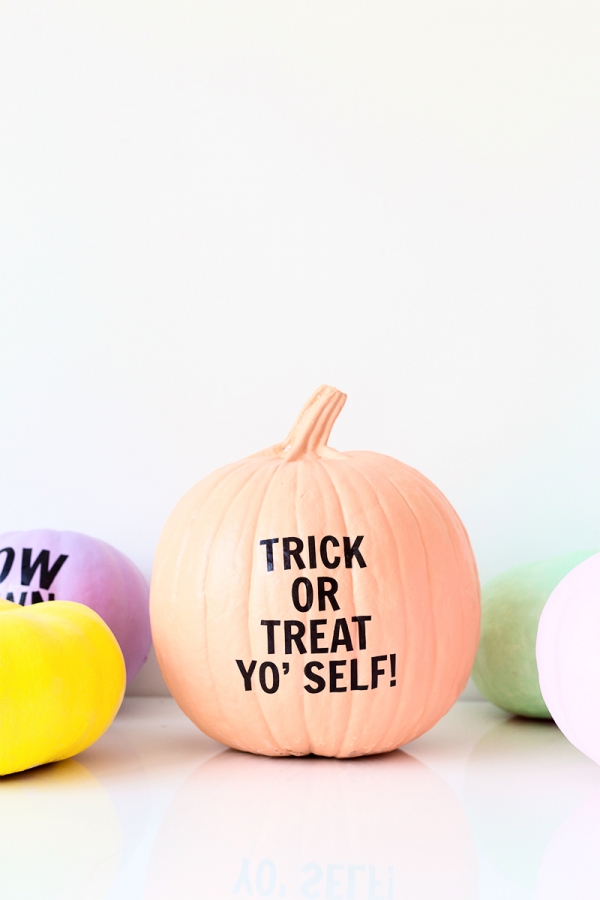 Colorful pumpkins with words on it