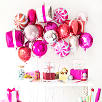 A Goodies + Gift Wrap Holiday Party (+ DIY Present Balloons!)