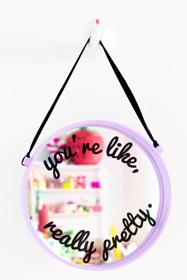 A mirror with cursive letters