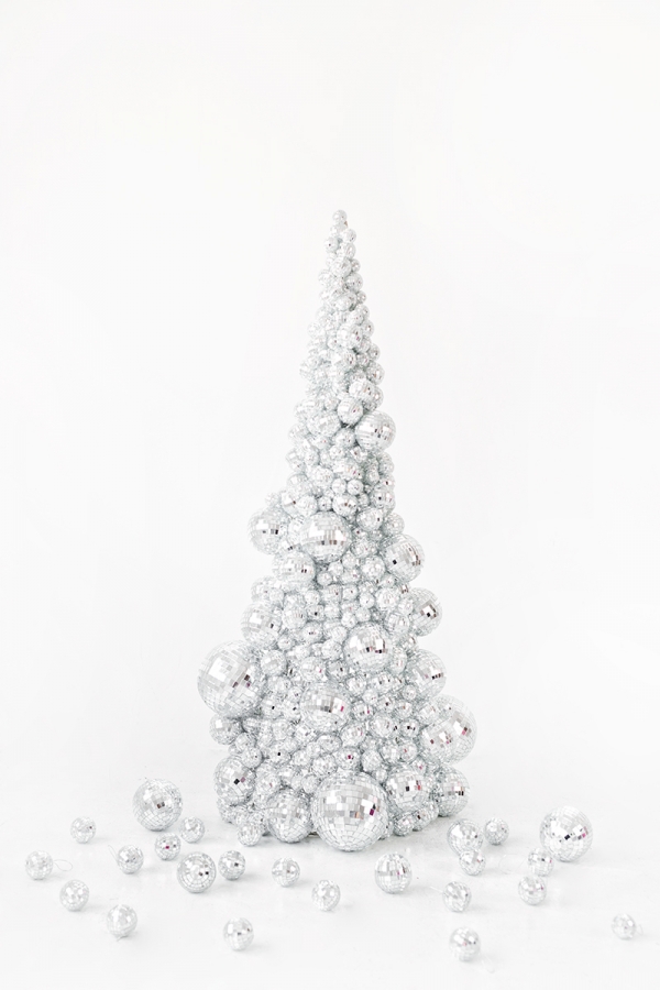 A silver ornament Christmas tree