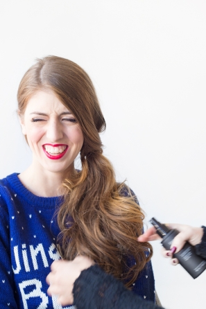 A woman with brown hair smiling