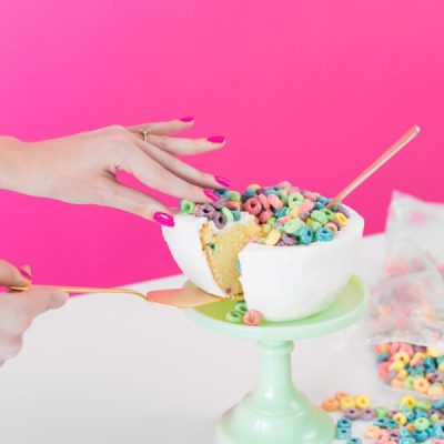 A cereal cake and a hand