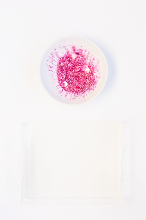 A plate with pink glitter