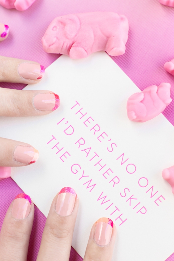 A card with pink writing on it