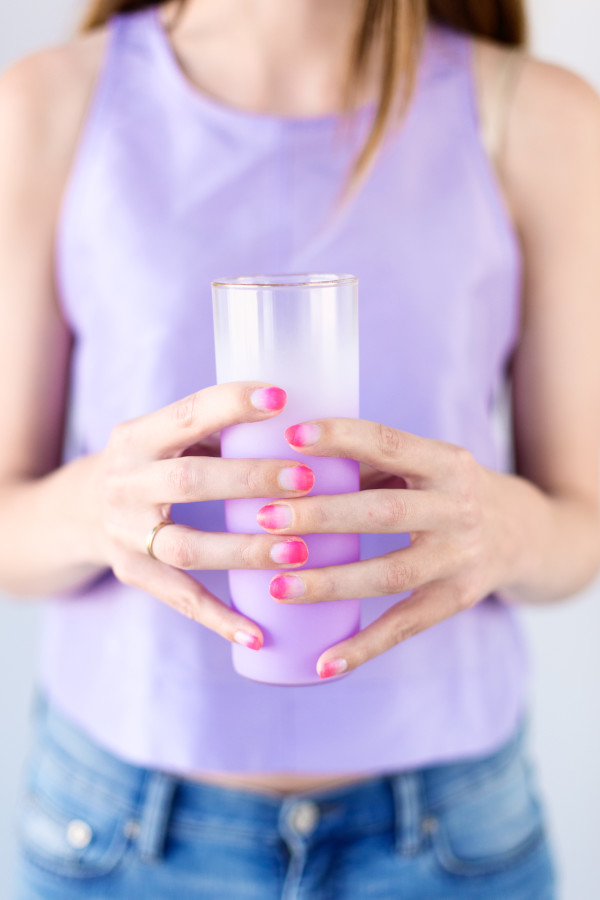 Someone holding a glass