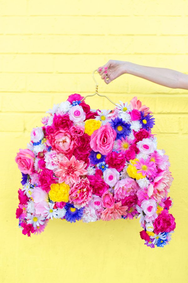 Someone holding a bouquet of flowers