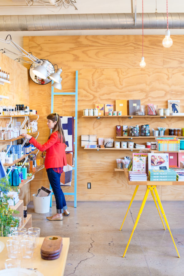 A woman looking around in a shop