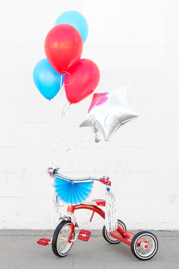 A bicycle and balloons