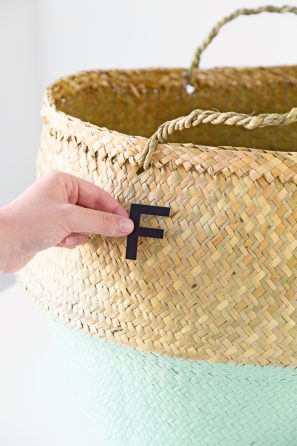 Laundry basket with \"F\" on it