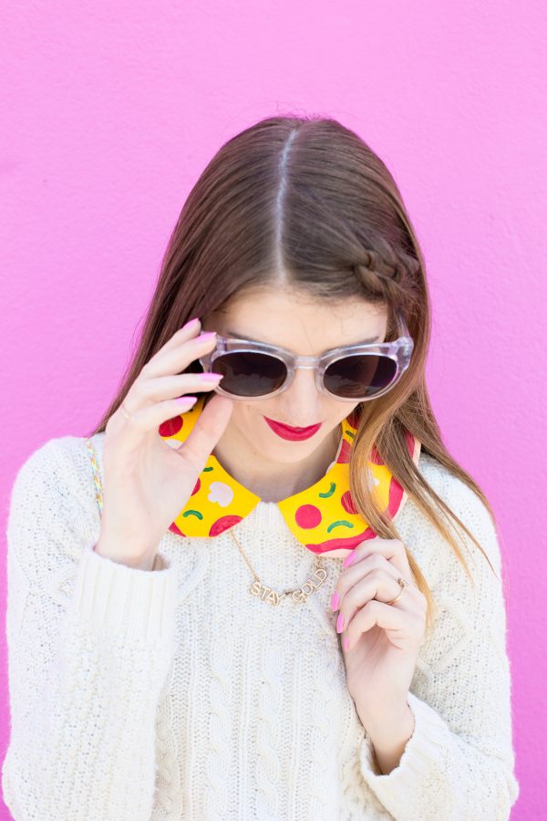 A woman wearing sunglasses posing for the camera