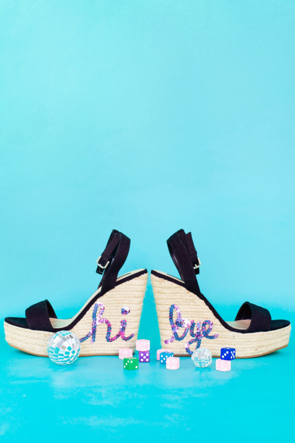 Heels with \"hi\" and \"bye\" on them